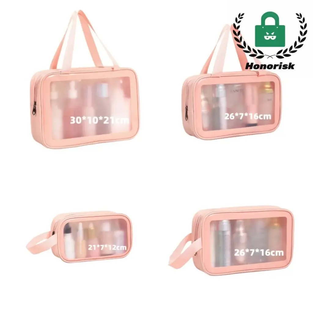 Pink nga transparent toiletry bag nga gibukhad, nagpakita sa organisado nga mga botelya sa pagbiyahe ug usa ka toothbrush sa sulod.