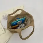 Bolso acolchado acolchado para mulleres que se amosan con cadernos e bolsa nunha superficie de tecido lixeiro: perfecto para a personalización OEM/ODM.