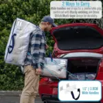 Хүн том ил тод хувцас өмсгөлтэй цүнхийг өргөн бариултай, цахилгаан товчоор байрлуулна; Энэ нь нугалсан ор дэрний дэр.