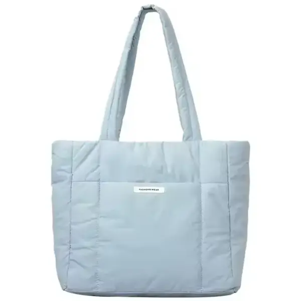 Blue Puffed Casual Handbag for Women with long handles and a small white front label, available for OEM and ODM customization.
