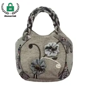 Nuevo diseño de lienzo de moda con bordado, con manijas trenzadas y flores decorativas de tela, Disponible para la personalización OEM/ODM.