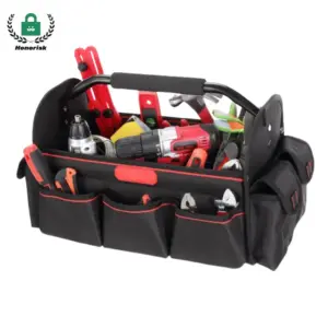 The Multi-Compartment Large Capacity Tool Tote Bag in black and red comes filled with various hand tools and a cordless drill.