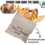 A Cotton Bread Drawstring Shopping Bag labeled "Put Your Design Here," વિવિધ બ્રેડથી ભરેલા, ફૂડ-ગ્રેડ ટી.પી.યુ. ફેબ્રિક અને સપોર્ટિંગ OEM/ODM કસ્ટમાઇઝેશનથી બનેલું છે.