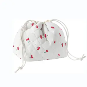 Cotton Drawstring Toiletry Bag: white quilted pouch with cherry print and side-tied cords, available for OEM/ODM customization.