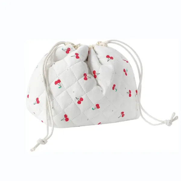 Cotton Drawstring Toiletry Bag: white quilted pouch with cherry print and side-tied cords, available for OEM/ODM customization.