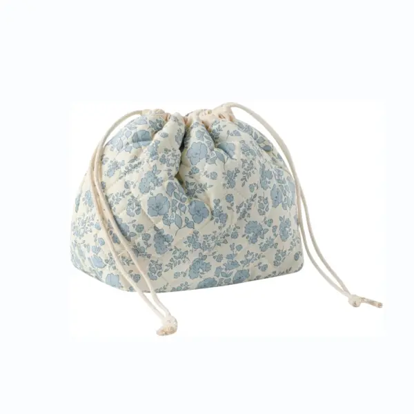 Light blue floral-patterned Cotton Drawstring Toiletry Bag on a white background; small size, OEM/ODM available.