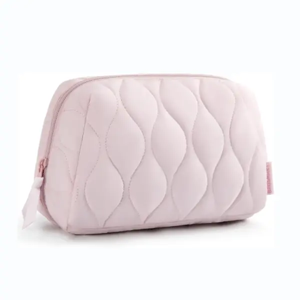 Puffy Portable Makeup Bag in light pink with quilted, wavy stitching and a zipper, displayed on a white background—ideal for OEM/ODM customization.